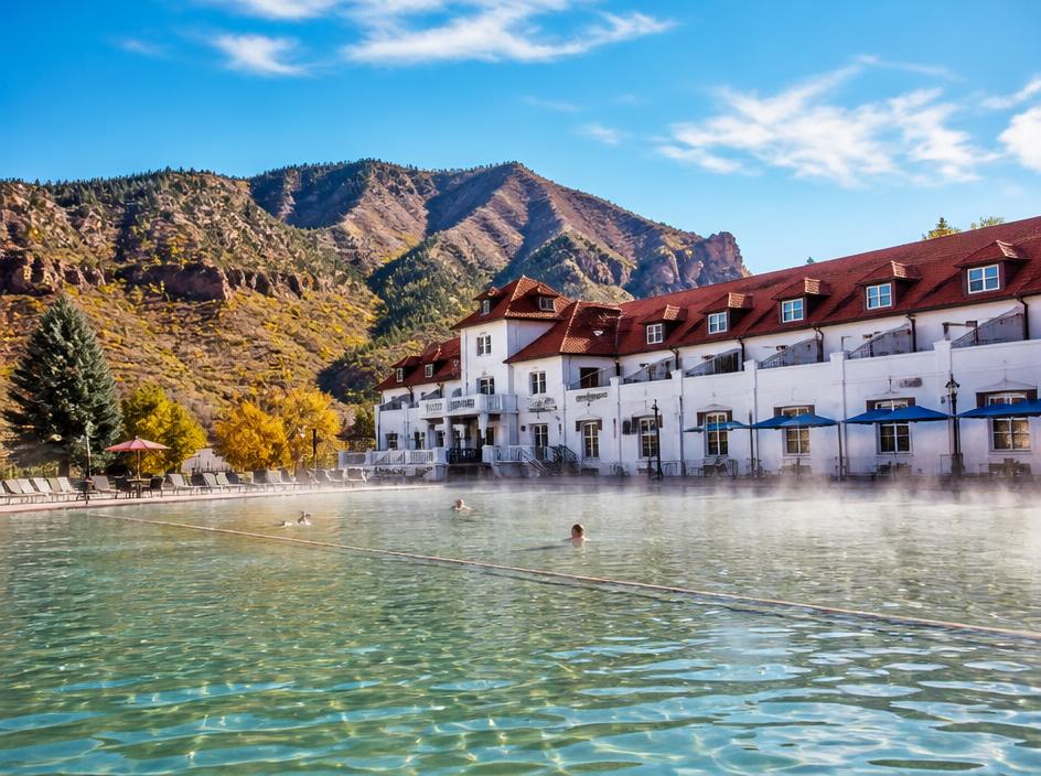 Glenwood Springs — the historic mineral hot springs pool with the lodge and Colorado mountains